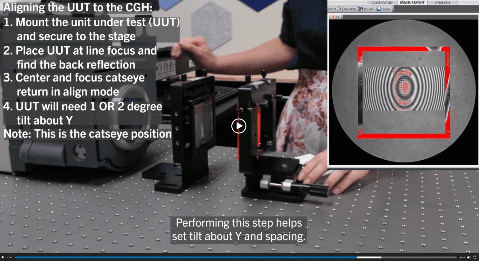 A still image from the video "How to Measure a Cylinder Optic" from AOM, where Dr. Christine Muccianti aligns a cylinder optic to an AOM computer-generated hologram (CGH).