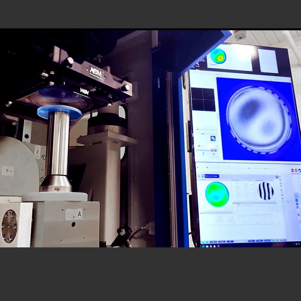 High-tech optical metrology equipment in use at Arizona Optical Metrology (AOM) for precise lens and optical component analysis.